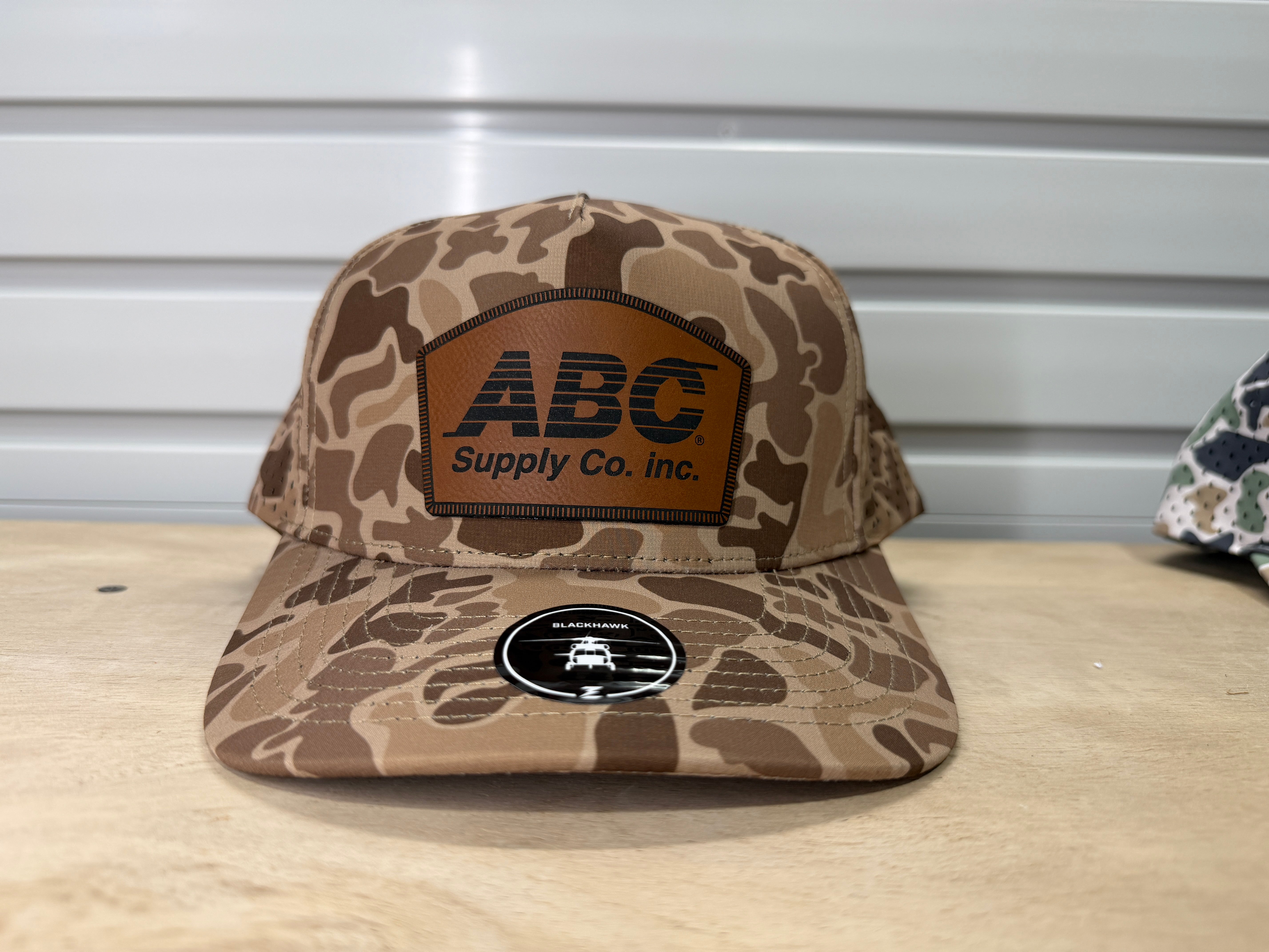 ABC Supply | Blackhawk Hat | Brown Old School Camo | Rawhide Rounded Dome Patch